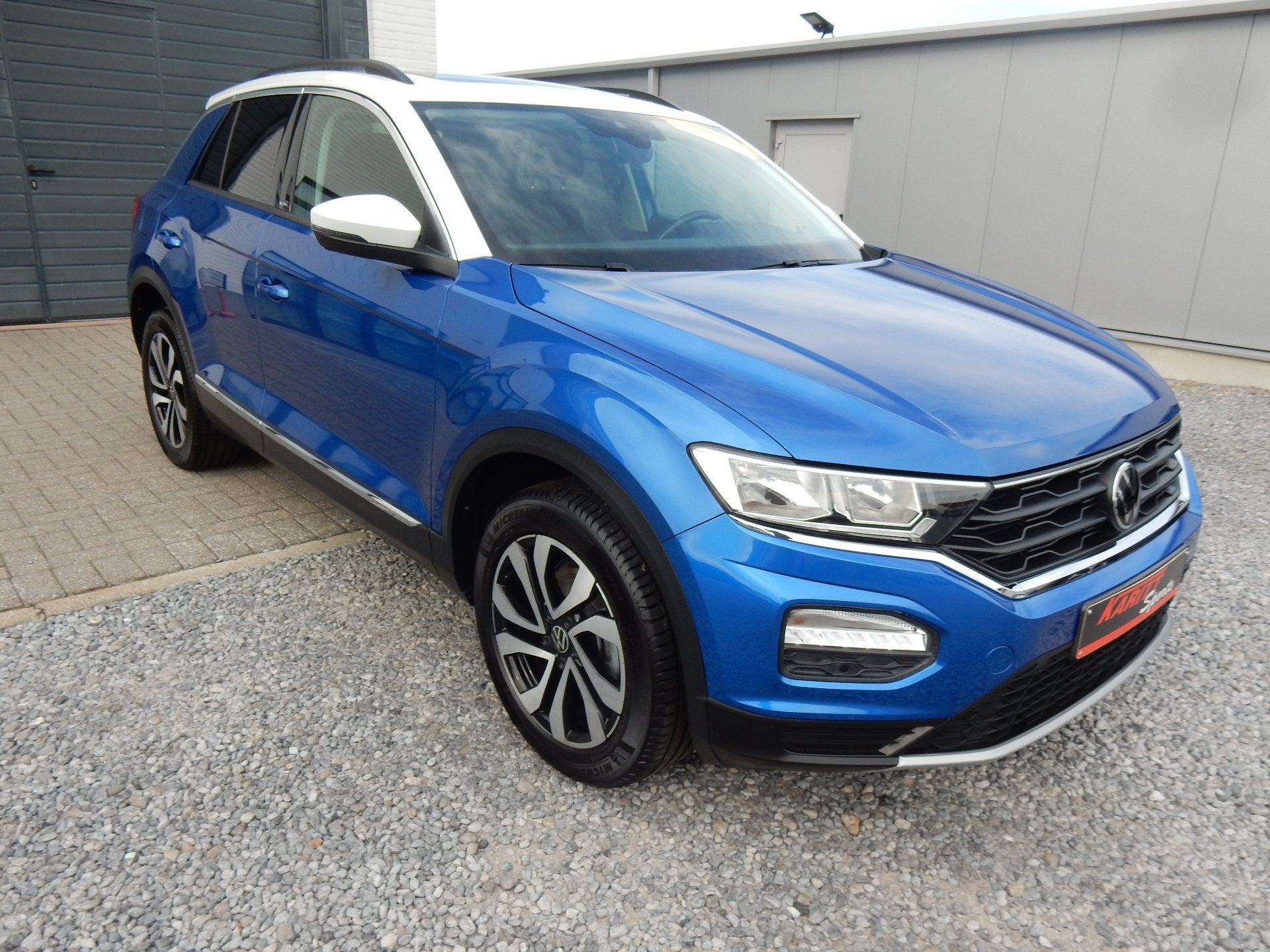 Volkswagen T-Roc TSI Style 150pk Trekhaak / pano-dak /camera, Auto's, Stof, Gebruikt, Overige kleuren, Adaptive Cruise Control