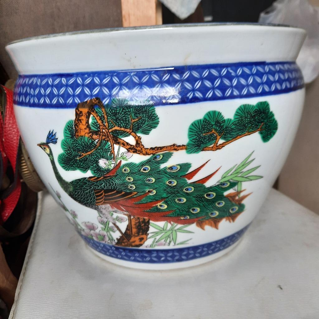 Grand pot à fleurs à tronçonneuse, Enlèvement