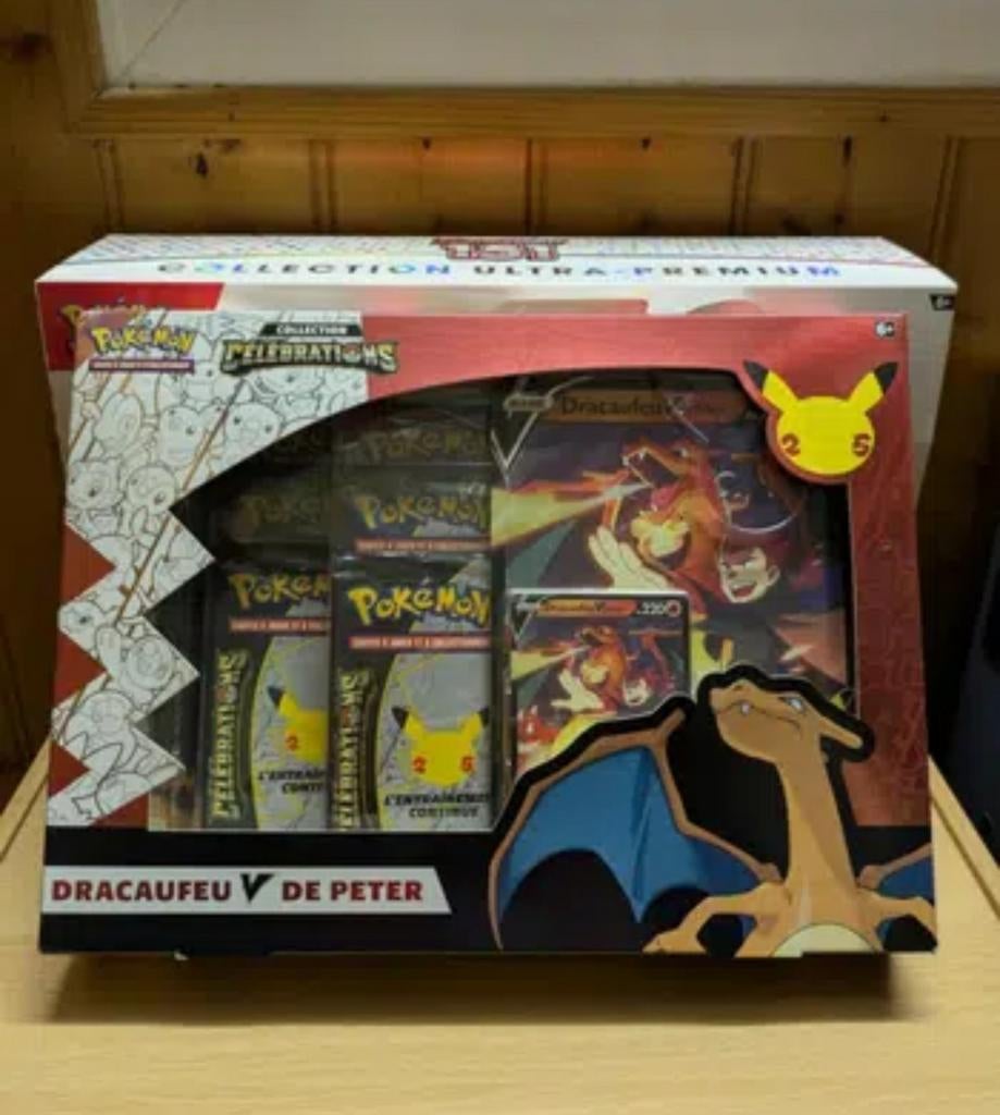 Coffret pokémon célébrations Dracaufeu de Peter, Hobby & Loisirs créatifs, Enlèvement