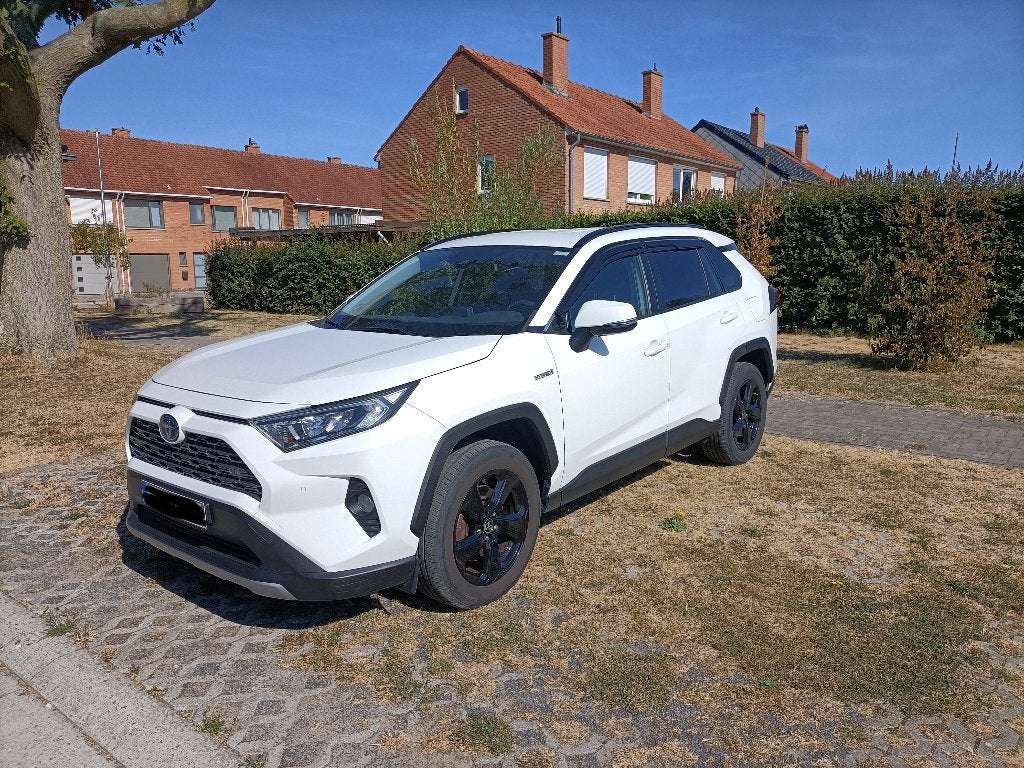 Toyota Rav 4 HYBRID 77000KM, Auto's, Stof, Euro 6, Lichtsensor, Wit