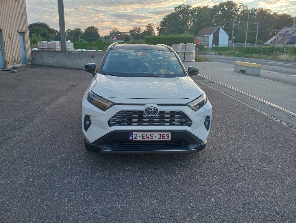 toyota Rav4  benzine hybride zwart wit awd 131 kw, Automaat, 131 kW, Wit, Leder