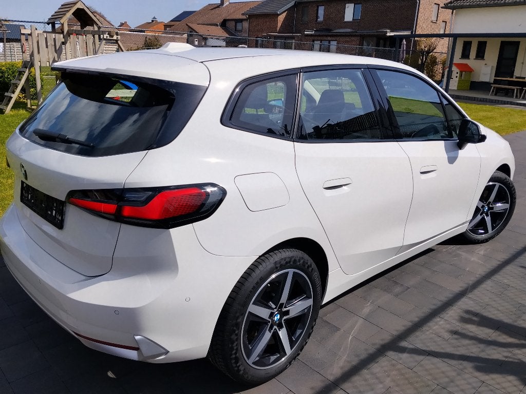 BMW 218i Active Tourer | 2 Jaar Gar. | Carpas | Nieuwstaat, Auto's, Wit, 2 Reeks Active Tourer, Particulier, Dealer onderhouden