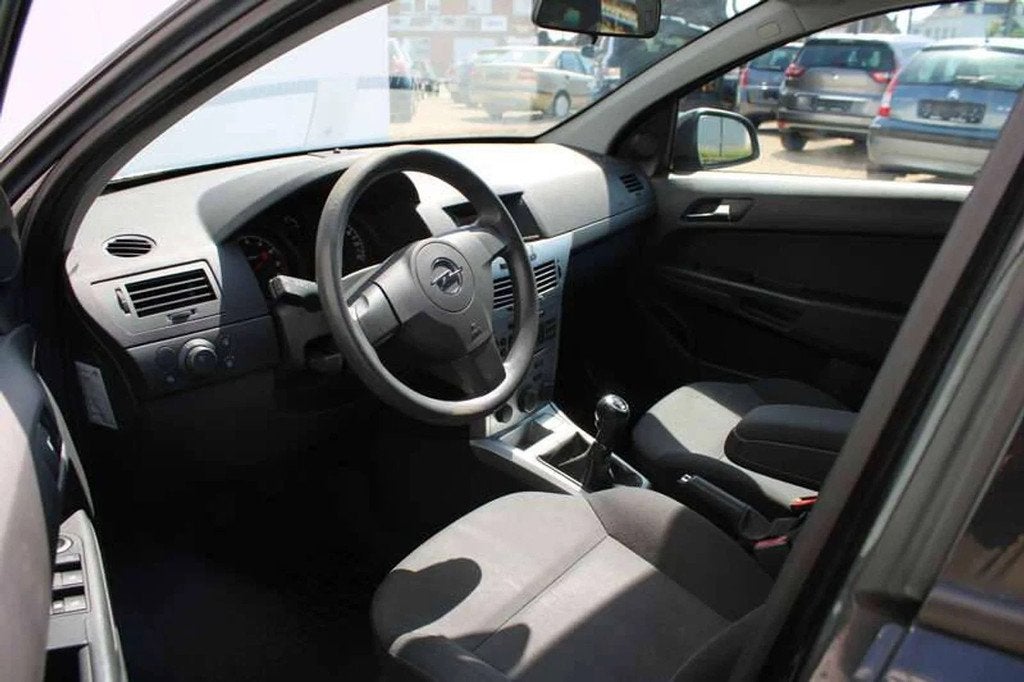 Opel Astra 1.6i Airco/Cruise Inclusief 2 JAAR garantie!, Auto's, Euro 5, Gebruikt, Zwart, 4 cilinders