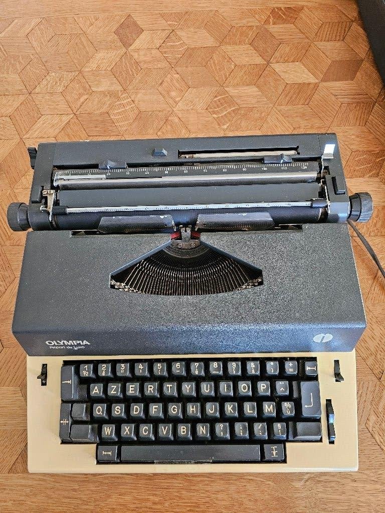 Olympia Report De Luxe — Machine à écrire électrique vintage, Divers, Enlèvement ou Envoi, Utilisé