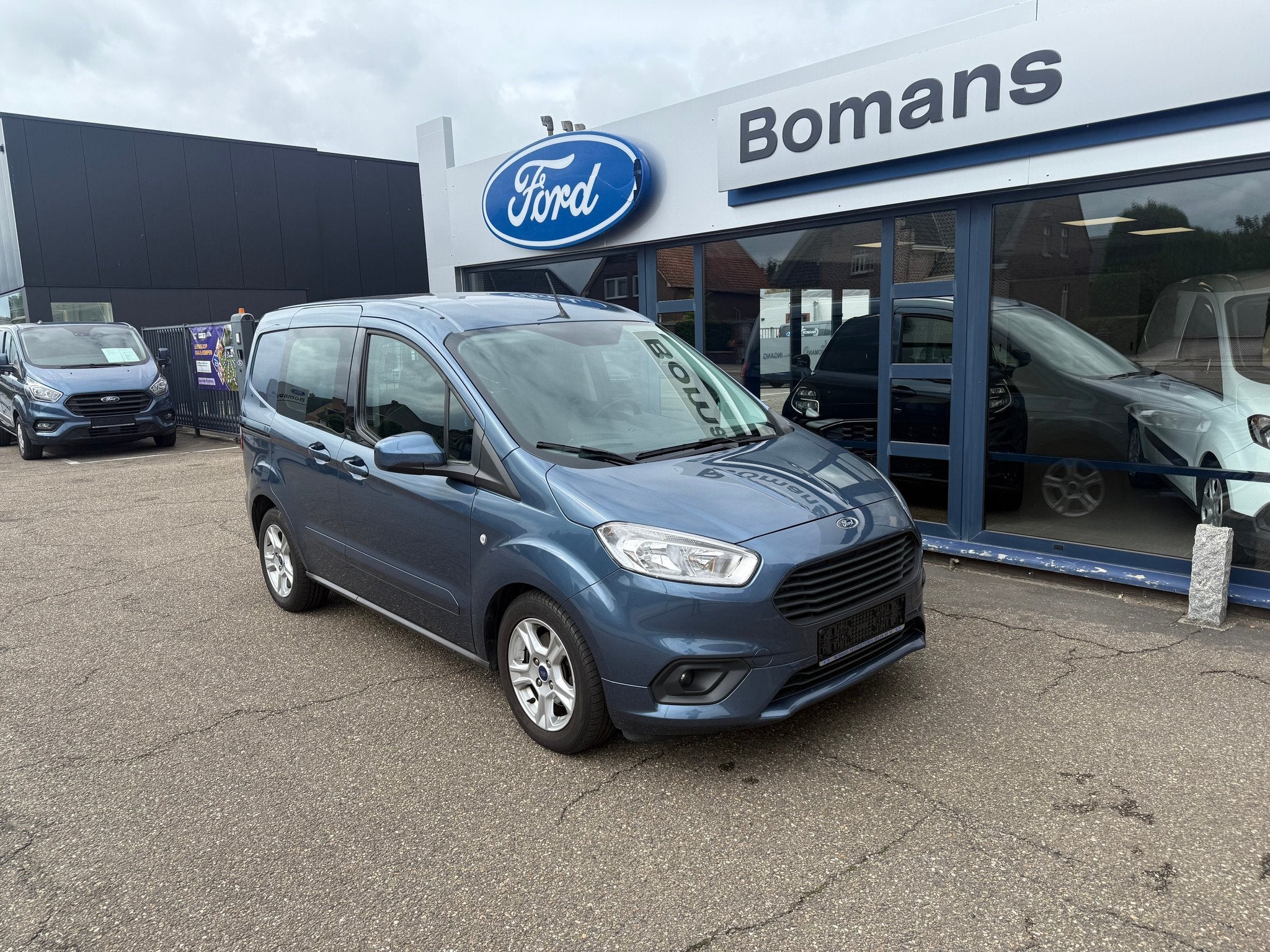 Ford Transit Courier Trend 1.0Ecoboost 100PK M6, Auto's, 4 deurs, Stof, Gebruikt, Blauw
