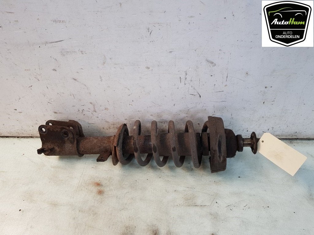 AMORTISSEUR OU ABSORBEUR DE CHOC AVANT GAUCHE (|8200212633|7, Utilisé, Renault
