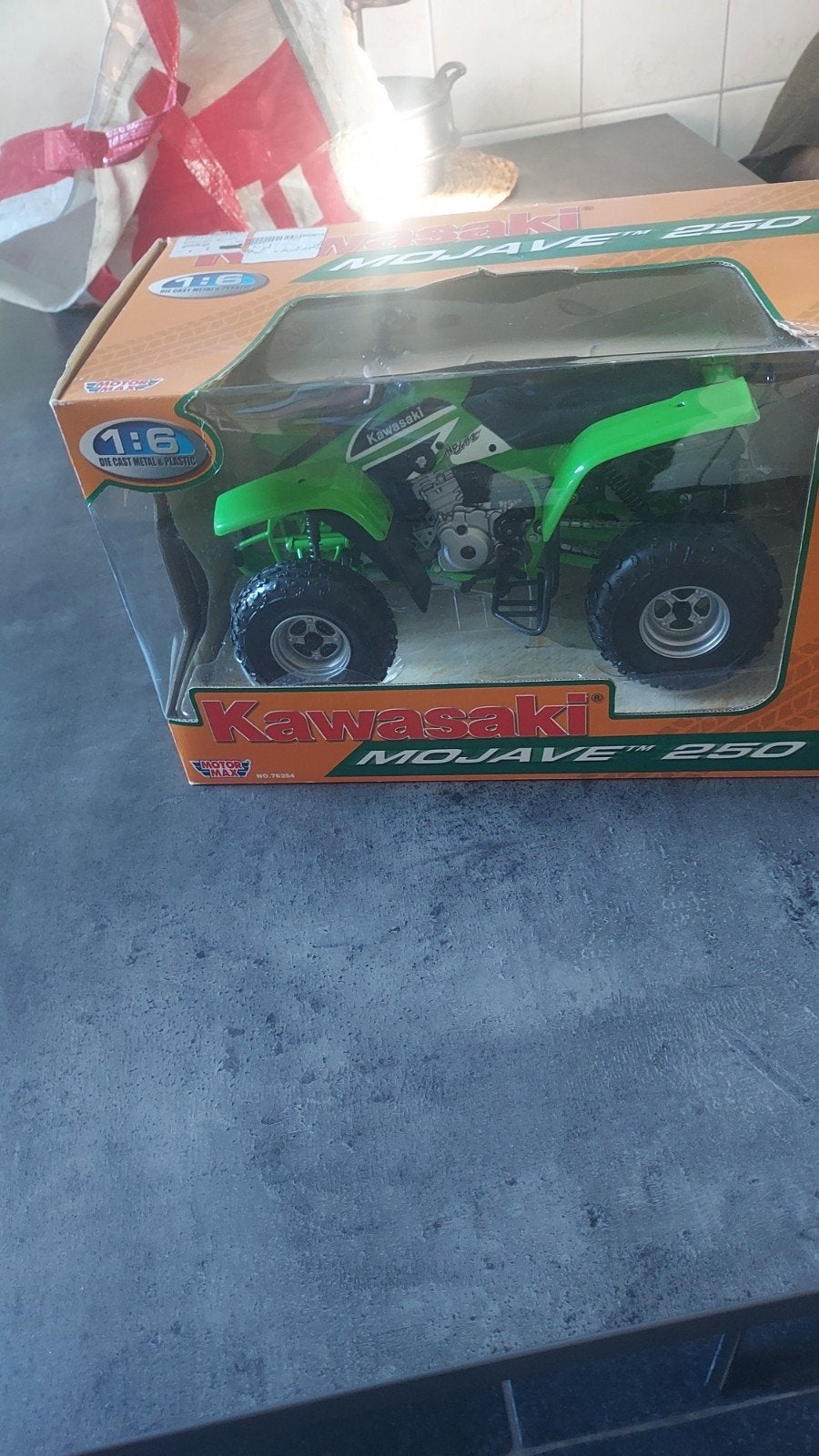schaalmodel kawasaki 250 ATV, Ophalen