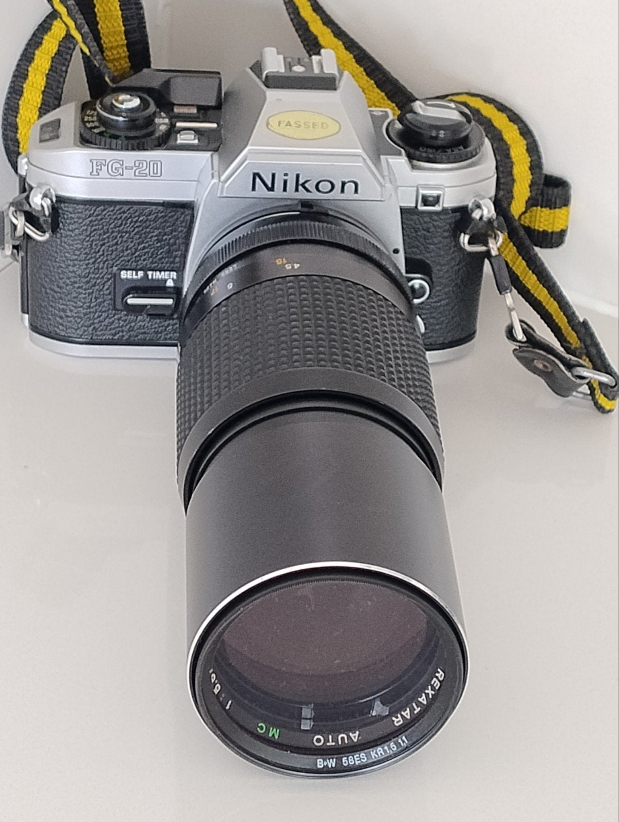 Nikon FG-20  Camera met een MC Auto Rexatar 300mm 1:5.6 lens, Audio, Tv en Foto, Ophalen of Verzenden, Gebruikt, Spiegelreflex