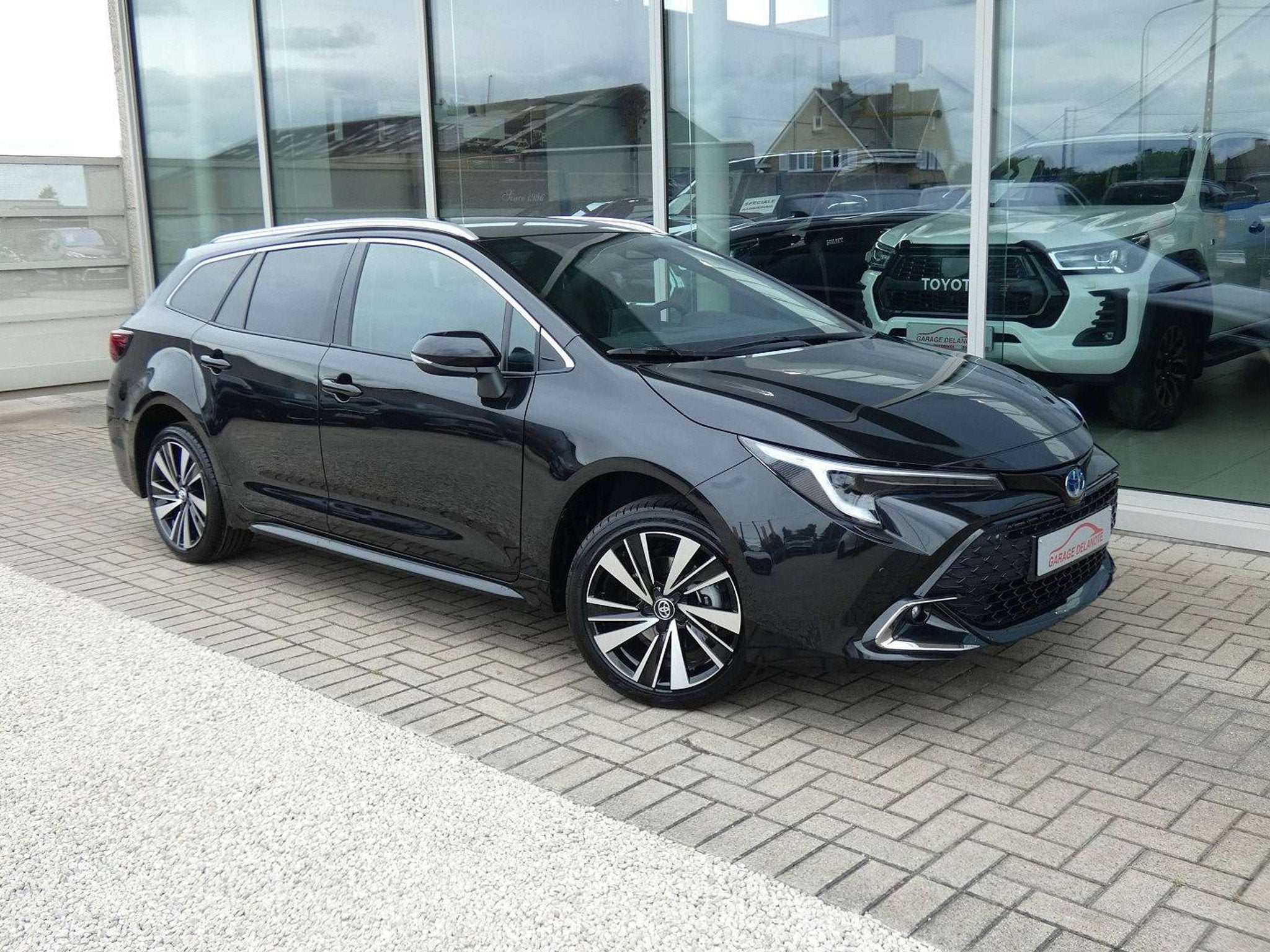Toyota Corolla 1.8 Hybrid 140pk STYLE+WINTER PACK +Stuurwiel, Auto's, Zwart, 4 cilinders, Corolla, Parkeersensor