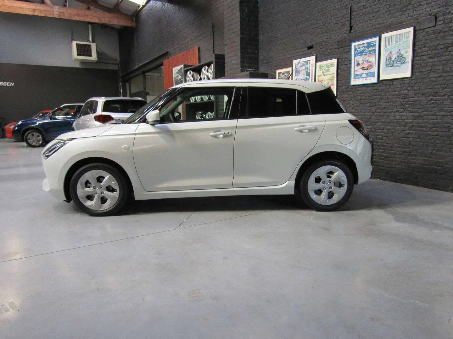 Suzuki Swift Swift 1.2i SHVS Grand Luxe+ CVT (bj 2025), Auto's, Automaat, Stof, Zwart, Bedrijf