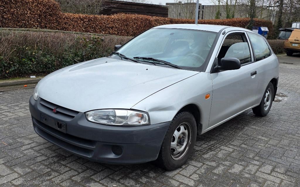 MITSUBISHI COLT 1999 SEULEMENT 37.000KM!!!, Autos, Mitsubishi, Argent ou Gris, Achat, Boîte manuelle, Tissu