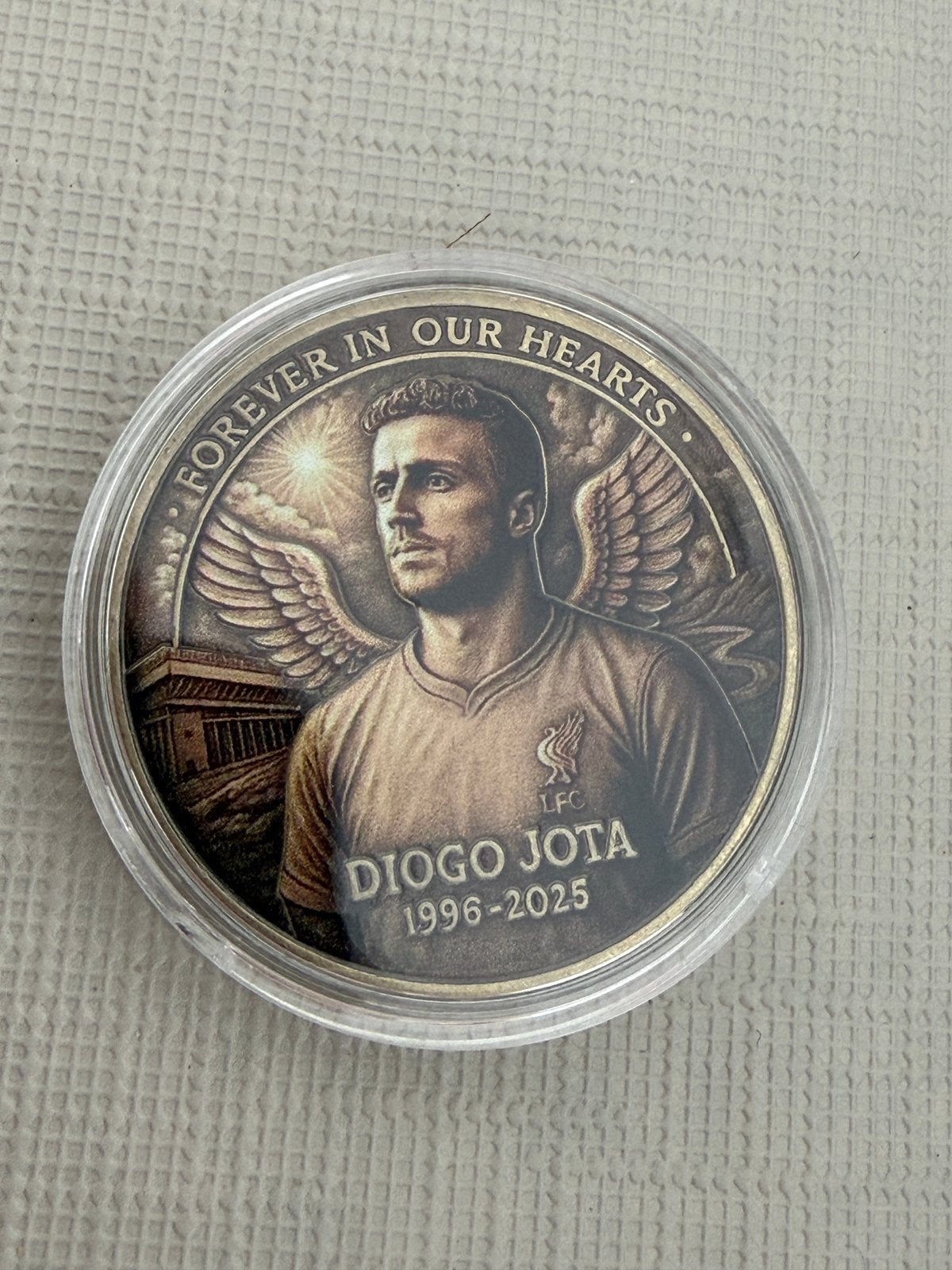 Voetbal munt diogo, Ophalen