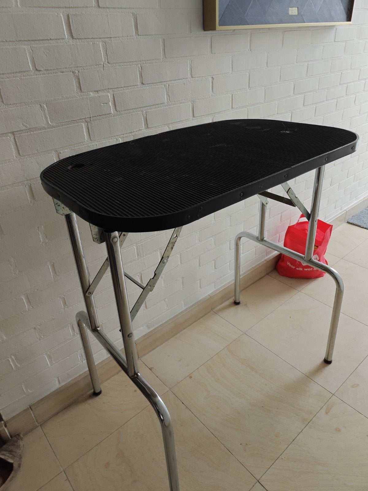 Trimtafel voor kleine hondjes, Enlèvement