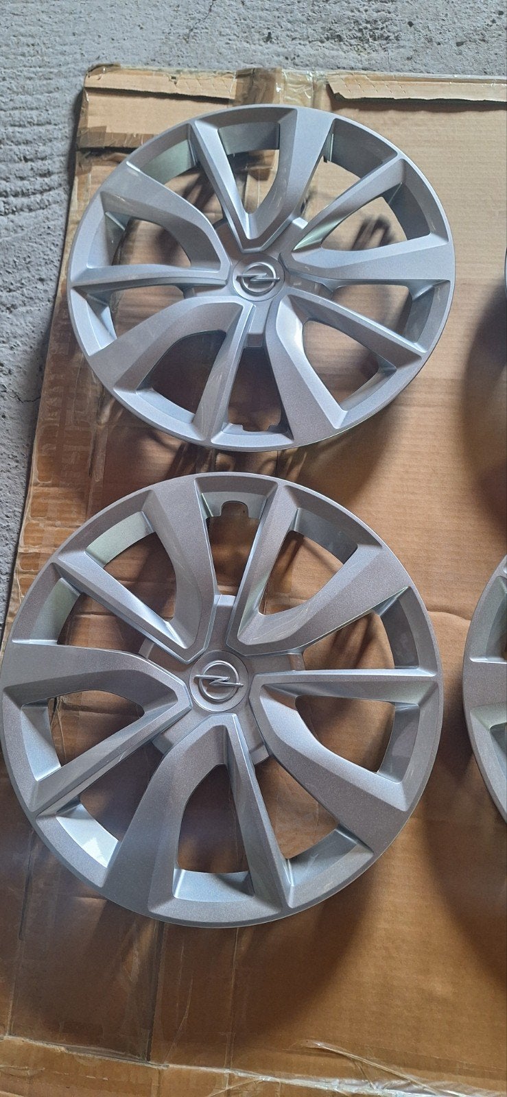 4 wieldeksels  16 inch -  originele Opel, Ophalen, Zo goed als nieuw