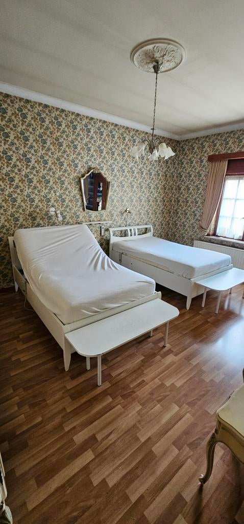 2 elektrische bedden van Bedking, Ophalen