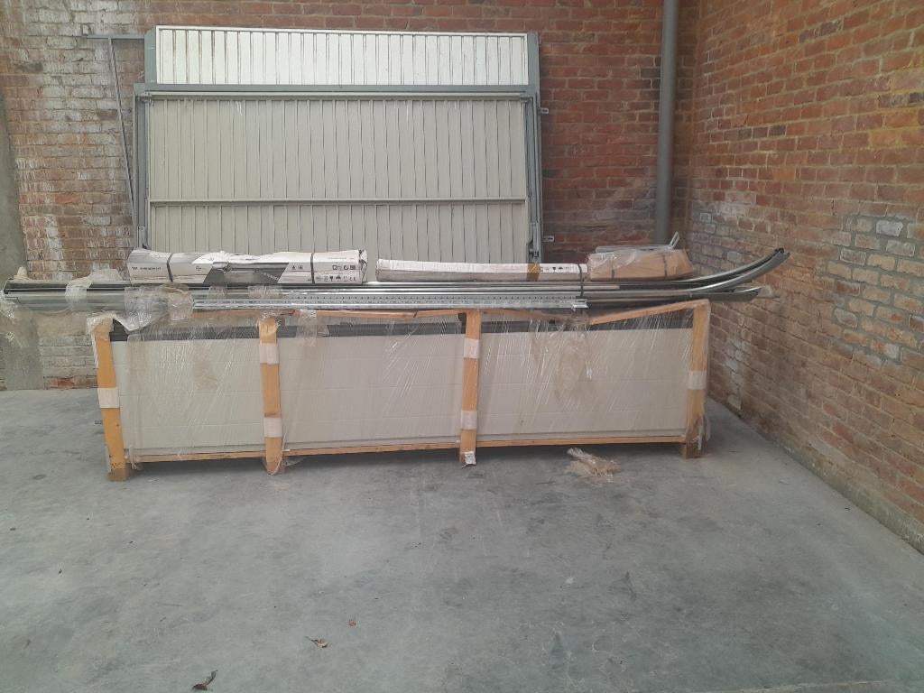 te koop nieuwe sectionale poort en 2 kantelpoorten 2de hands, Doe-het-zelf en Bouw, Ophalen of Verzenden, Metaal, Vouwdeur, 120 cm of meer