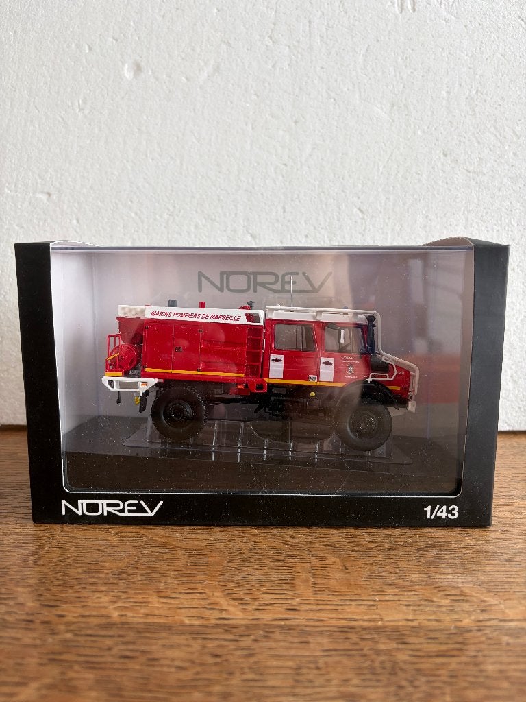 MERCEDES-BENZ - UNIMOG - MARINS POMPIERS DE MARSEILLE - 1:43, Hobby en Vrije tijd, Verzenden, Nieuw, Bus of Vrachtwagen, Norev