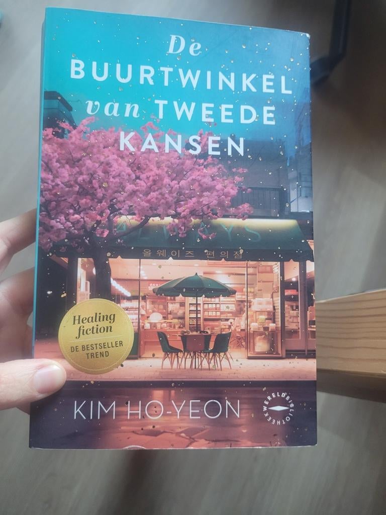 Kim Ho-Yeon - De buurtwinkel van tweede kansen, Boeken, Literatuur, Zo goed als nieuw, Ophalen of Verzenden