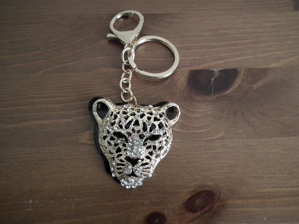 Porte-clés (Panthère dorée) nouveau., Envoi, Neuf, Animal et Nature
