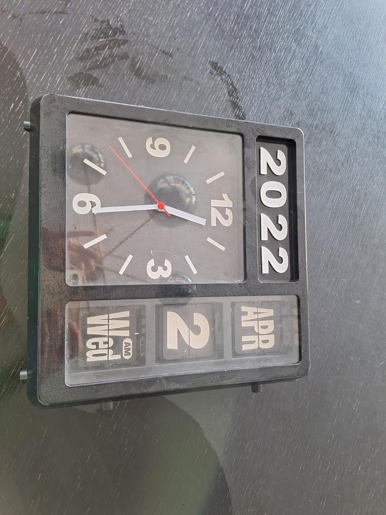 Vintage flip over klok, Ophalen
