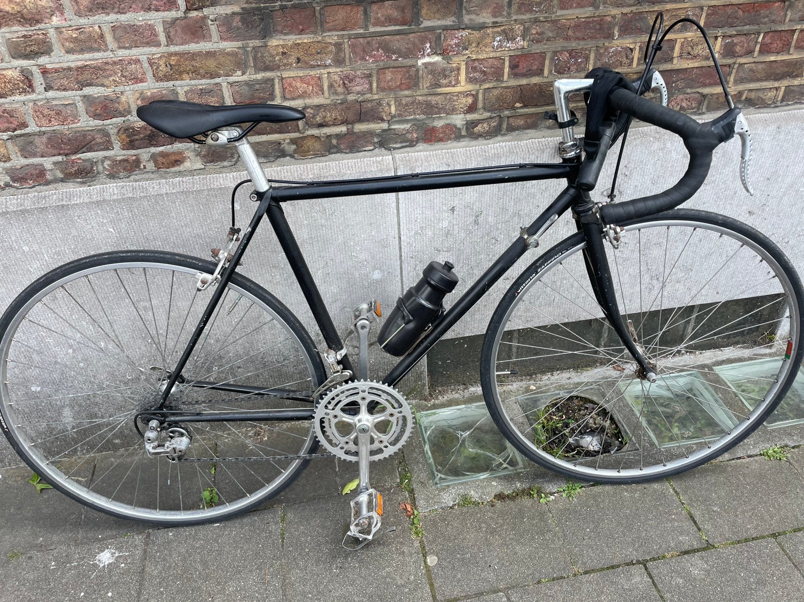 Opgeknapte oude koersfiets, Ophalen