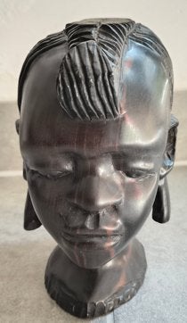 Handgemaakt Afrikaans vrouwenhoofd, Enlèvement