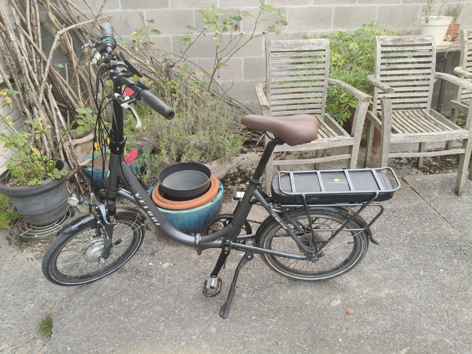Veloci elektrische plooifiets, Ophalen