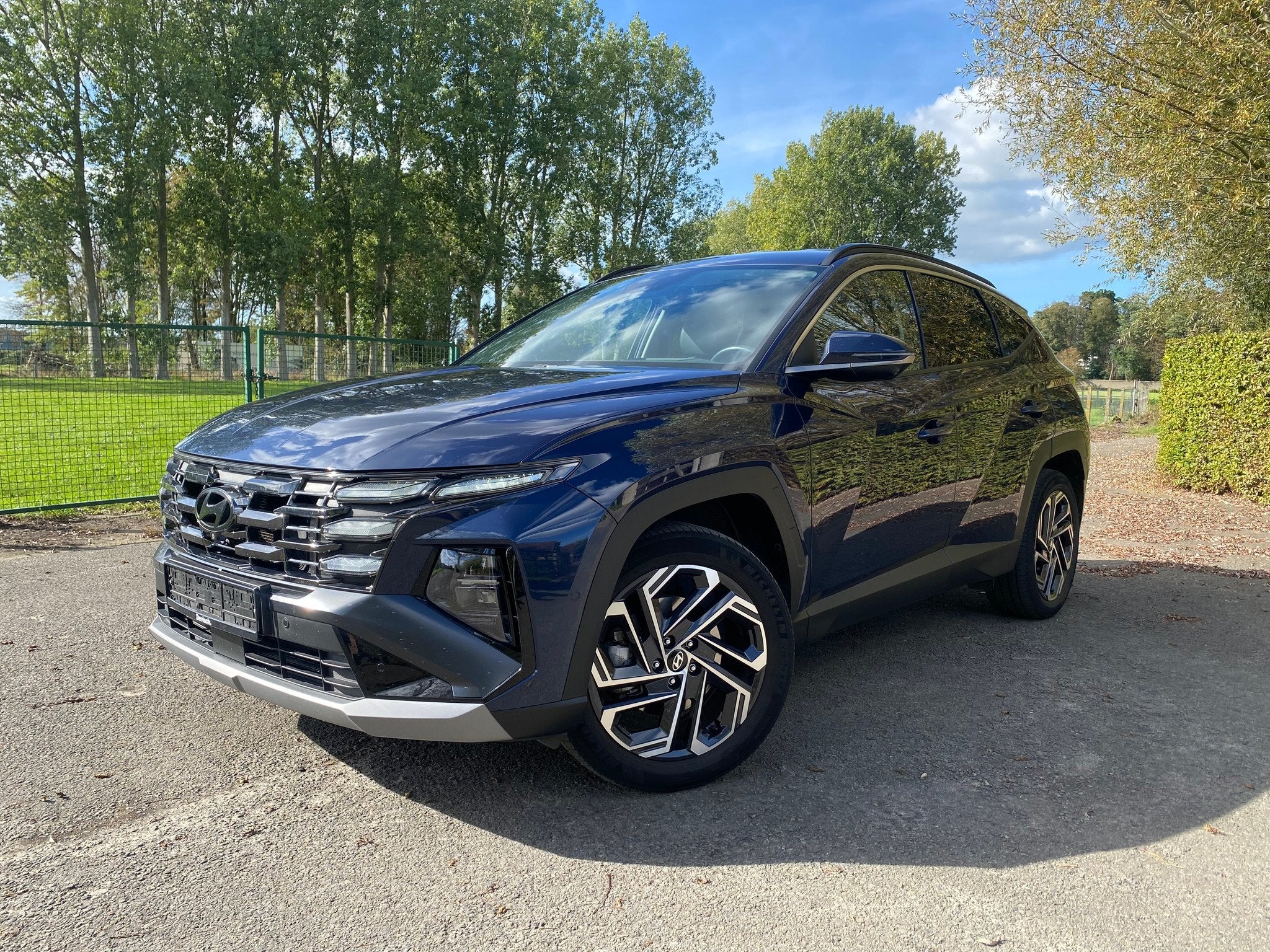 Hyundai Tucson HEV 1.6 T-GDi A/T SHINE 215 A6 (bj 2024), Gebruikt, 4 cilinders, Blauw, 5 zetels