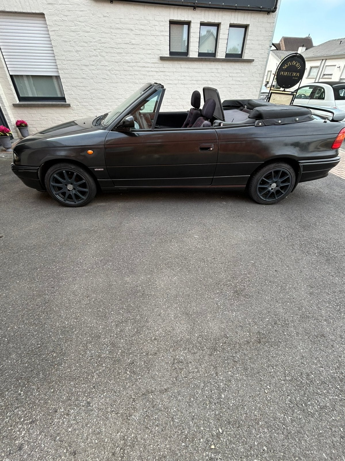 Opel Astra Cabriolet 1997, Auto's, Zwart, Cabriolet, Zwart, Particulier
