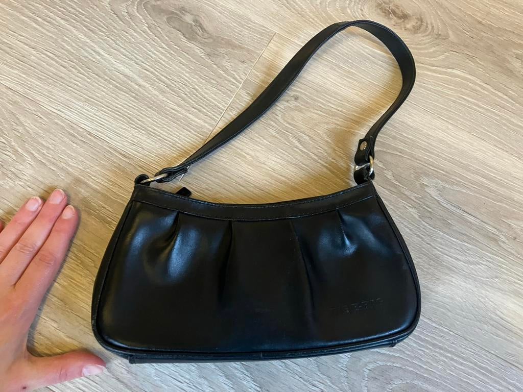 Handtas, Ophalen, Zo goed als nieuw