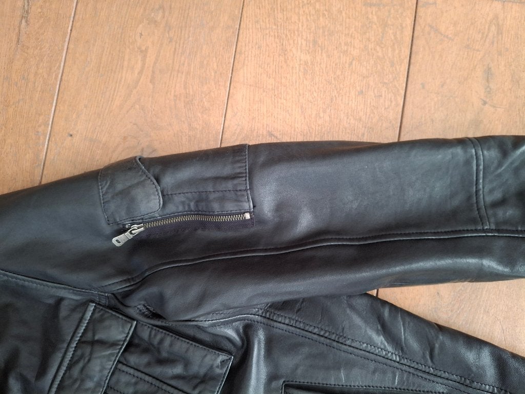 Mooie zwarte lederen vest, Ophalen, Zo goed als nieuw, Maat 52/54 (L), Zwart