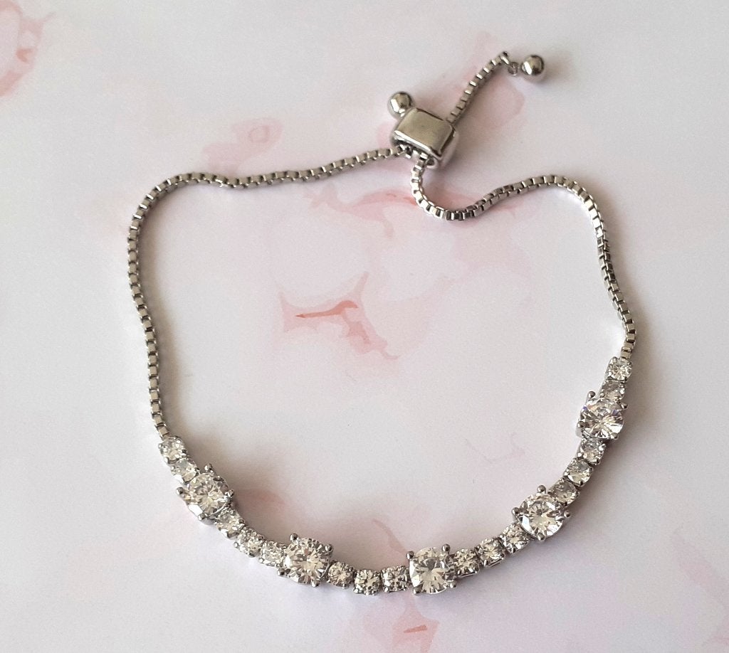 Armband tennisarmband met kristallen toggle Lovisa, Handtassen en Accessoires, Overige materialen, Met kristal, Nieuw, Ophalen of Verzenden
