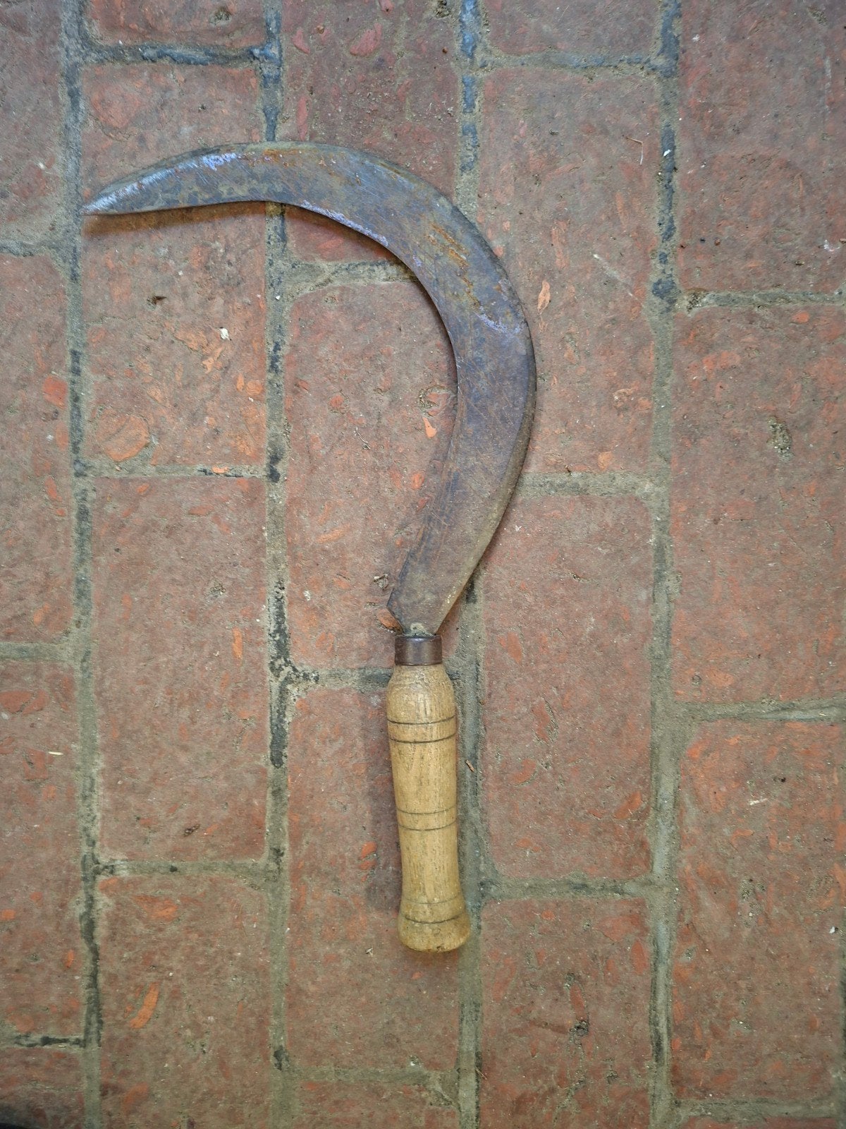 faucille à main/faux à main pour gauchers, Enlèvement