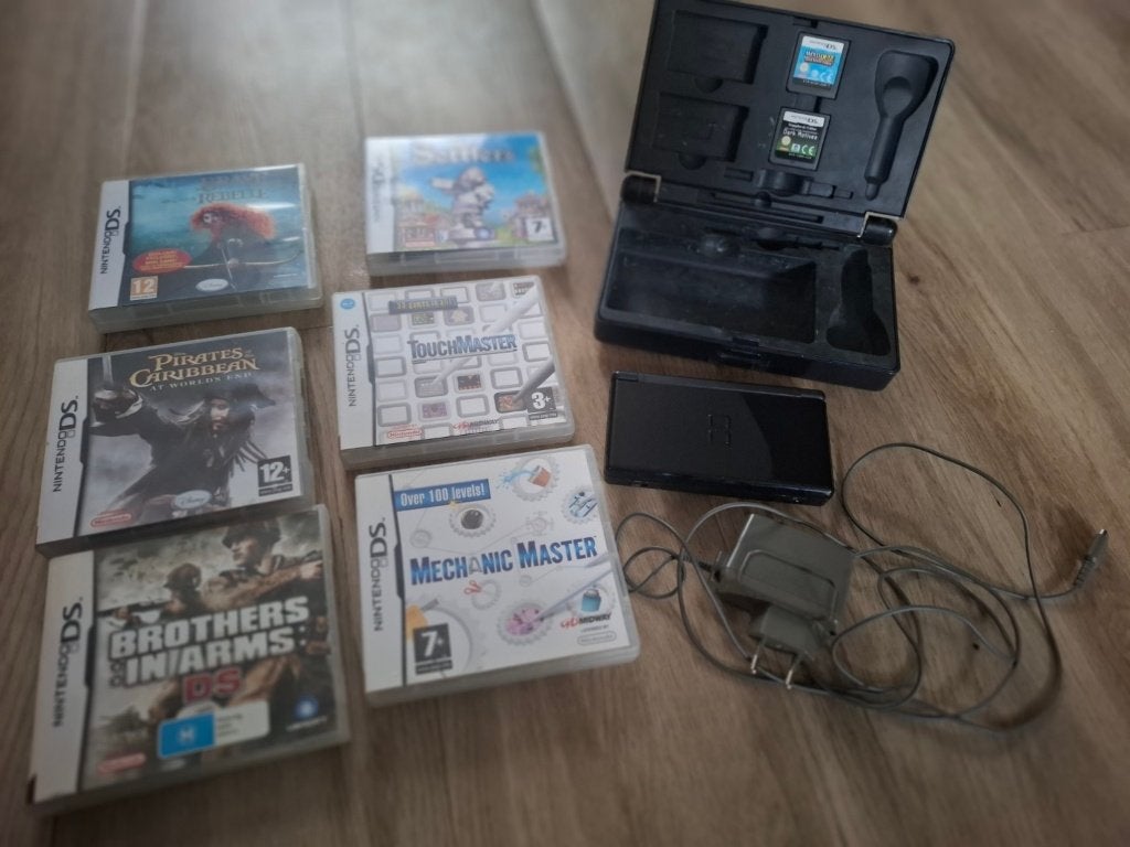 Nintendo Ds Lite + 8 spellen, Consoles de jeu & Jeux vidéo, Enlèvement ou Envoi, Utilisé, Avec jeux, Noir