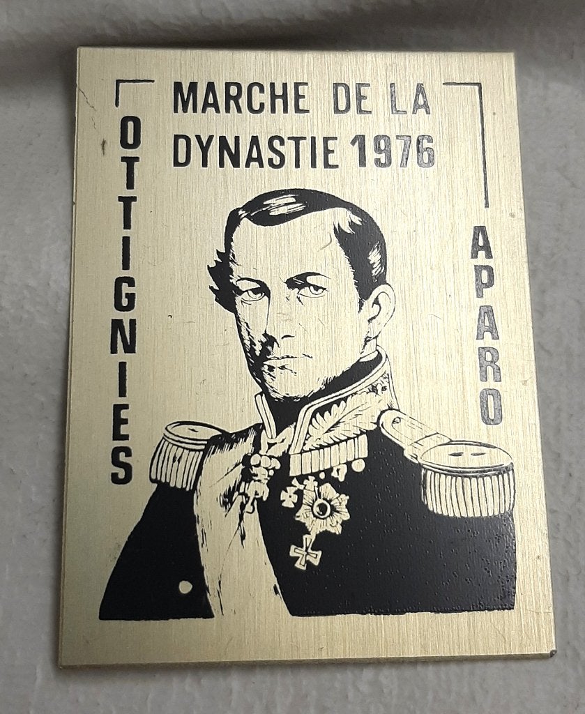 Plaque en métal « Marche de la Dynastie 1976 » à Ottignies, Enlèvement ou Envoi, Utilisé