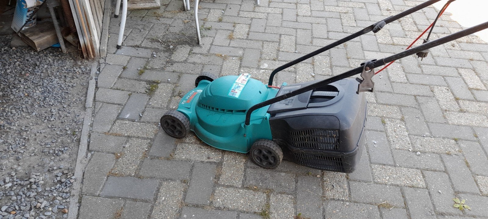 E, Ophalen, Gebruikt, Elektrische grasmaaier