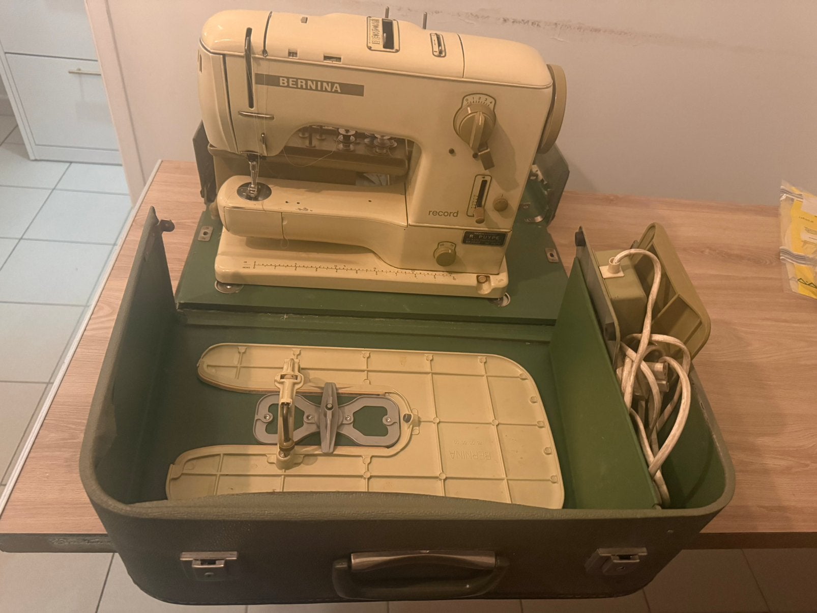 Bernina 73 platennaaimachine, Ophalen