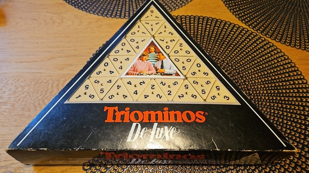 bordspel nieuw Triominos de Luxe, Hobby en Vrije tijd, Een of twee spelers, Ophalen of Verzenden, Zo goed als nieuw