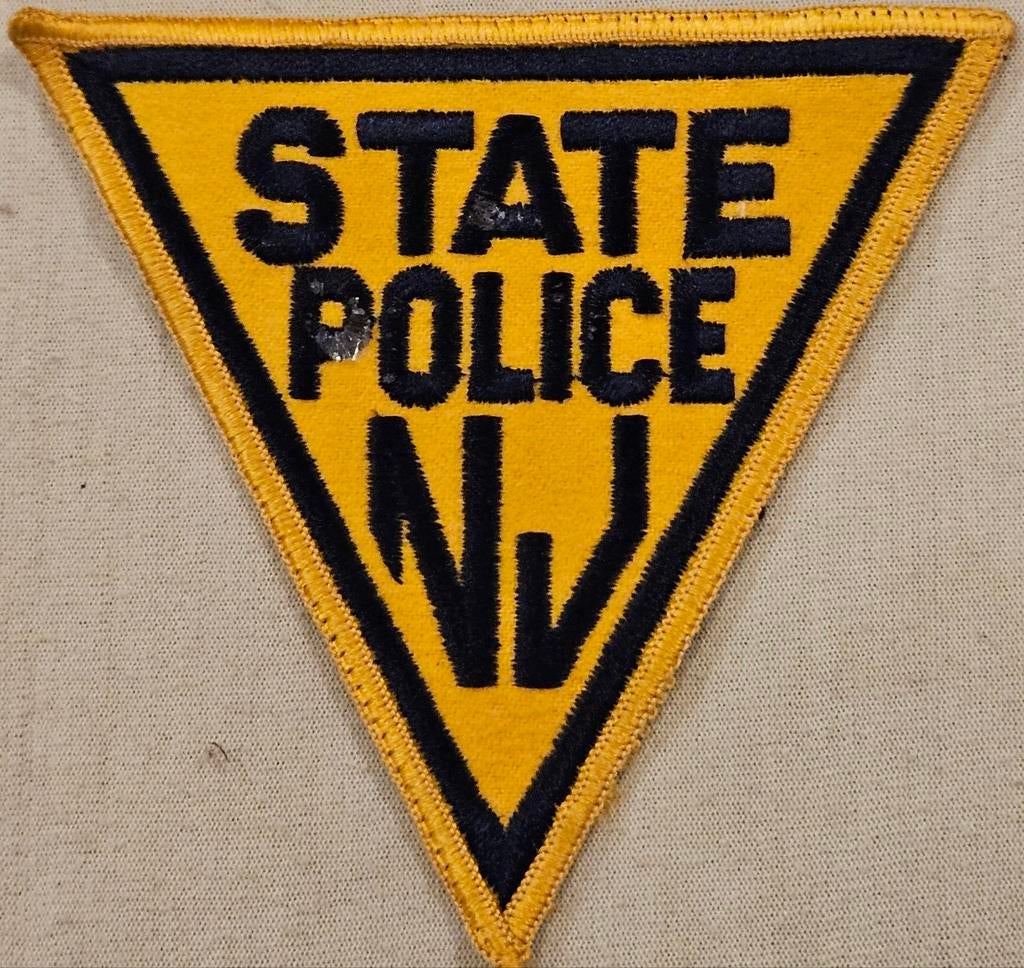 Écusson d'épaule de la police de l'État du New Jersey (NJSP), Enlèvement ou Envoi