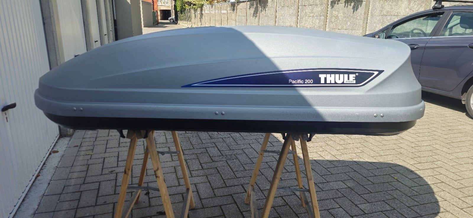dakkoffer thule pacific 200, Ophalen