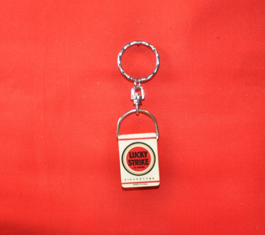 porte cle publicitaire lucky strike, Enlèvement ou Envoi, Utilisé, Marque