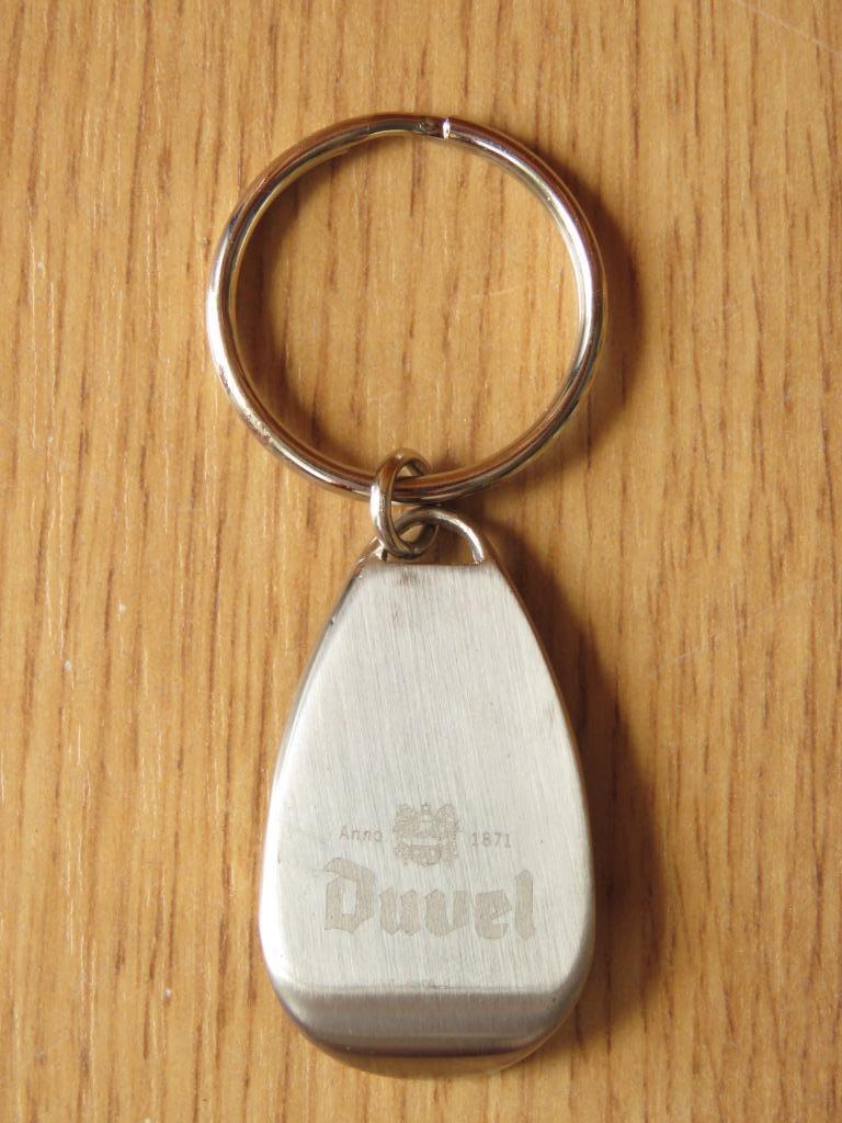 décapsuleur ouvre bouteille porte clefs Duvel en métal, Collections, Marques de bière, Comme neuf, Ouvre-bouteille, Duvel, Enlèvement ou Envoi