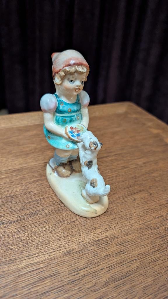 Porseleinen beeldje Nitto van meisje met hond, Ophalen