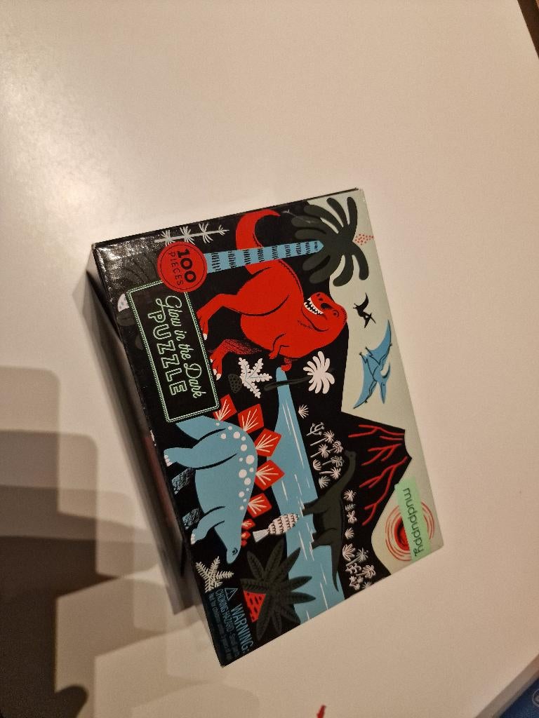 Puzzel 100 stukken Glow in the dark DINO, Ophalen, Zo goed als nieuw