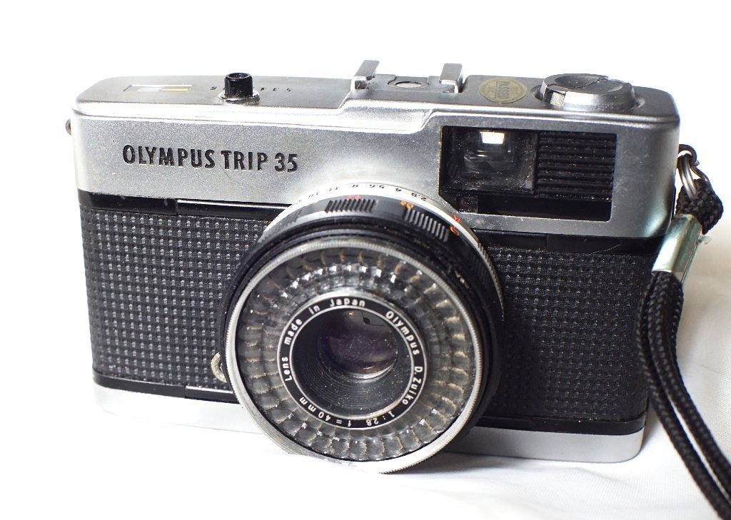 Olympus Trip 35 en zijn Zuiko 40 mm 2.8-lens, Audio, Tv en Foto, Fotocamera's Analoog, Ophalen of Verzenden, Gebruikt, Spiegelreflex