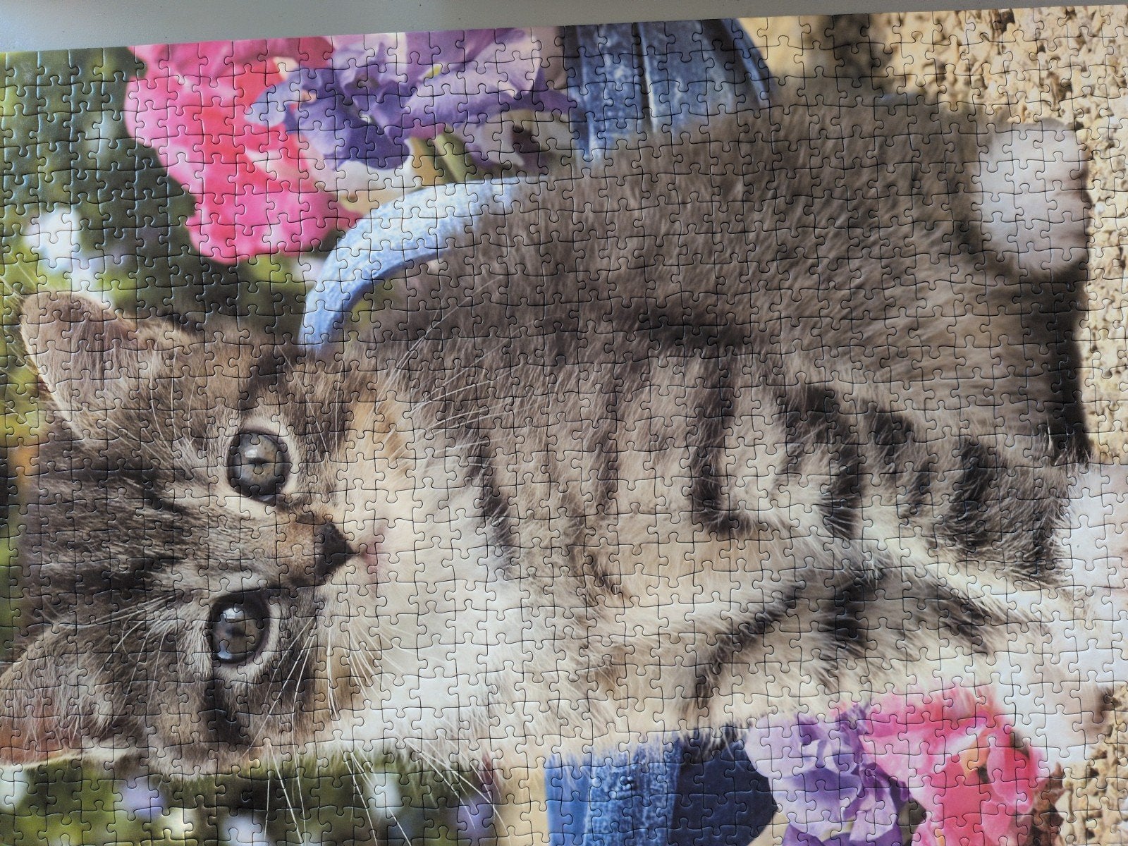 Ravensburger puzzel 1000 stuks, poesje in de tuin, Hobby en Vrije tijd, Ophalen