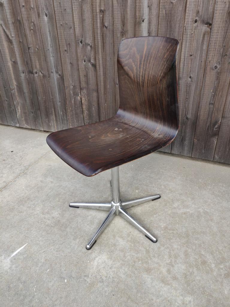 Vintage draaistoel, Ophalen