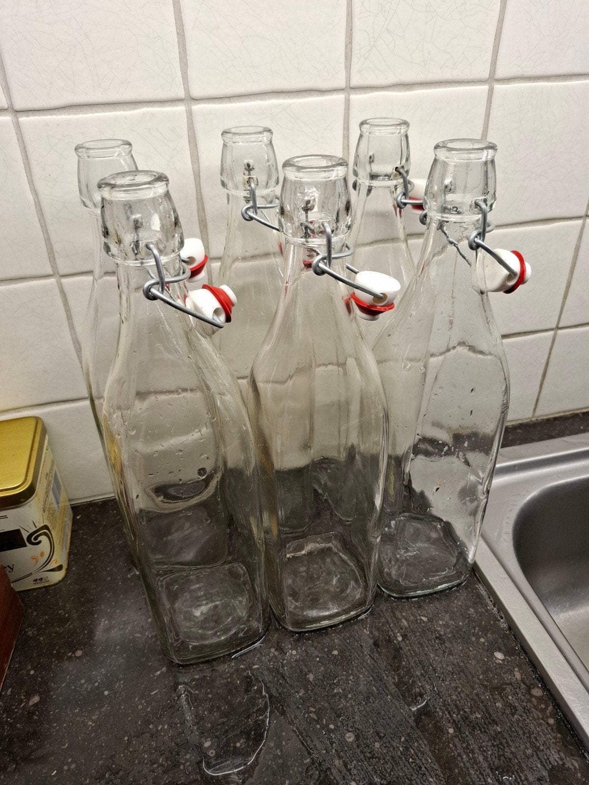 6 afsluitbare flessen, Ophalen