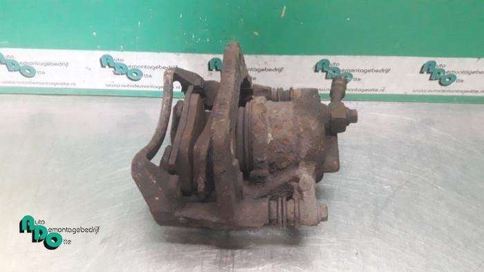 Etrier de frein (pince) avant gauche d'un Opel Combo (Combo, -, Opel, 3 mois de garantie, Utilisé