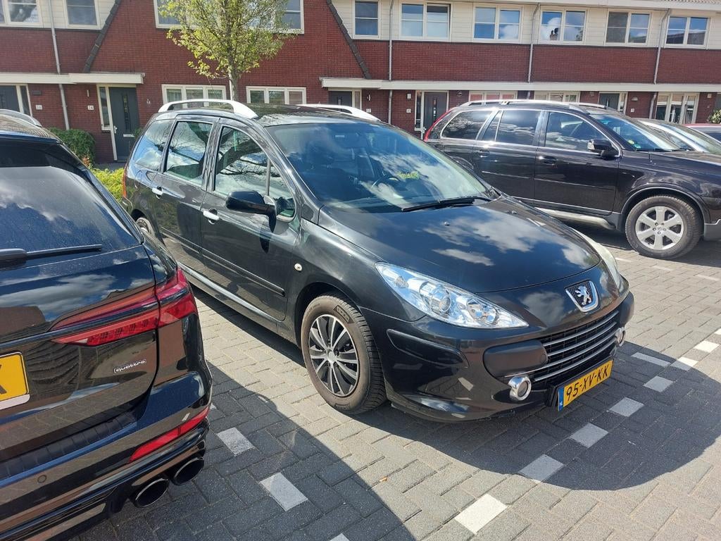 Peugeot 307 1.6 HDI 80KW SW 2007 Airco 7 persoons, Auto's, Voorwielaandrijving, Stof, USB, Zwart
